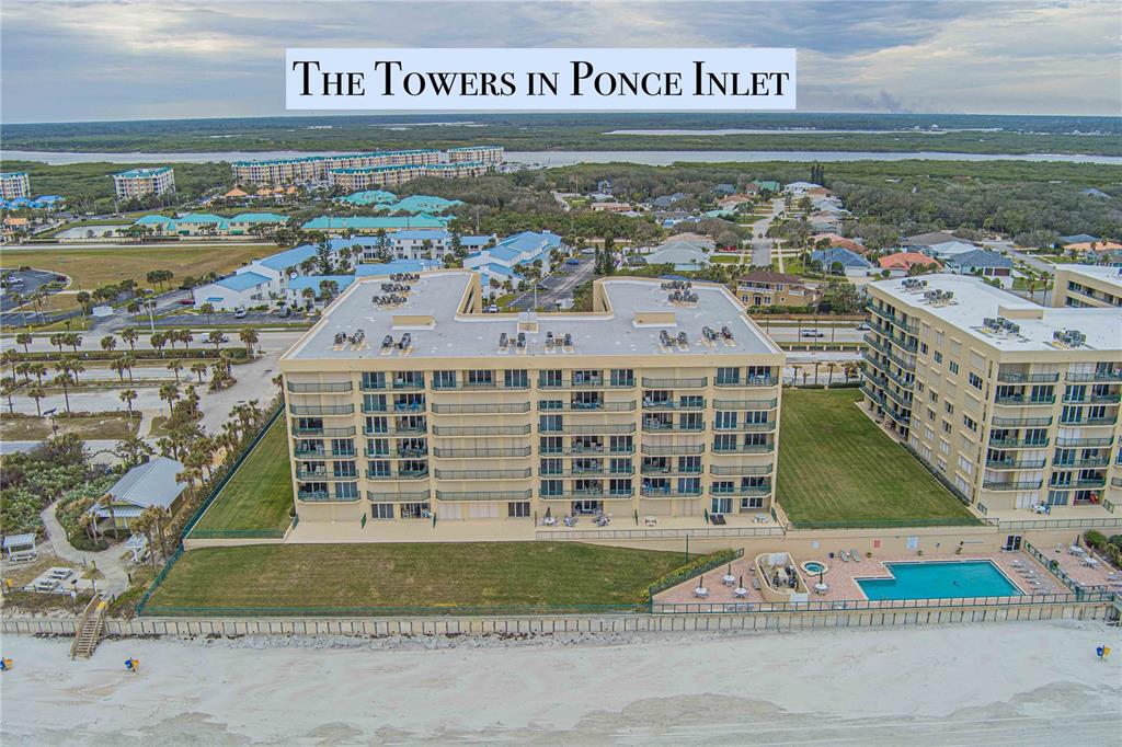 4575 South Atlantic Avenue, Unit 6209 Ponce Inlet, FL 32127 - Photo 1 of 53 a front view of a multi story parking building