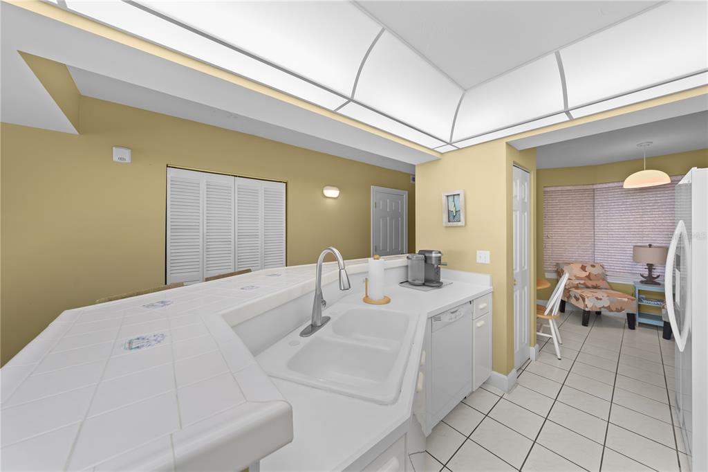 4575 South Atlantic Avenue, Unit 6209 Ponce Inlet, FL 32127 - Photo 15 of 53 a en suite bathroom with a double vanity sink and a mirror