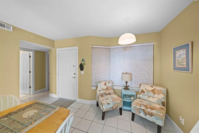 a spacious bathroom with a mirror and a shower