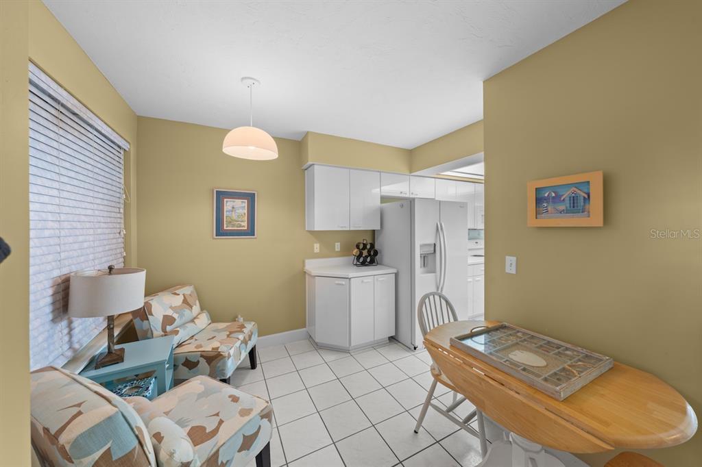 4575 South Atlantic Avenue, Unit 6209 Ponce Inlet, FL 32127 - Photo 18 of 53 a living room with furniture and a table