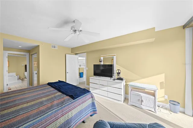 a bathroom with a glass door shower