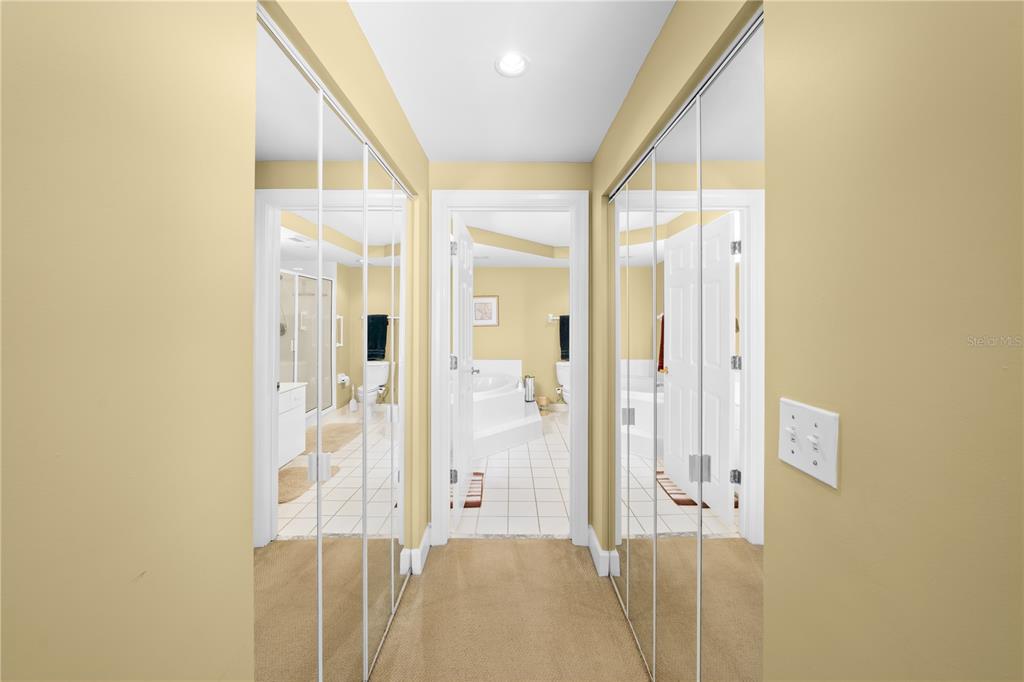 4575 South Atlantic Avenue, Unit 6209 Ponce Inlet, FL 32127 - Photo 27 of 53 a bathroom with a glass door shower