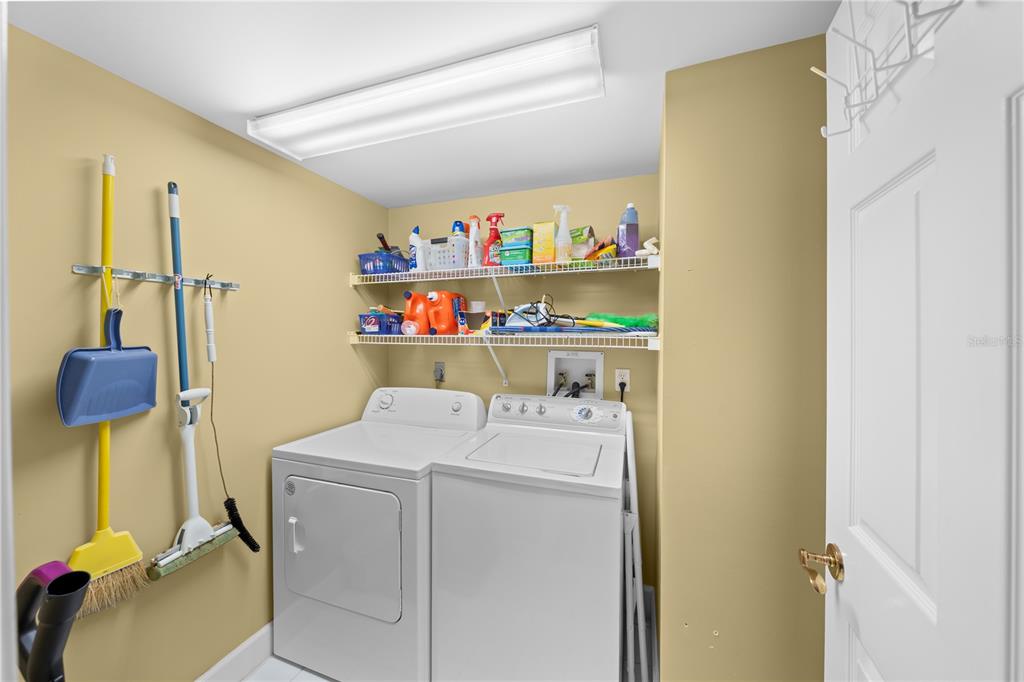 4575 South Atlantic Avenue, Unit 6209 Ponce Inlet, FL 32127 - Photo 40 of 53 a utility room with dryer and washer
