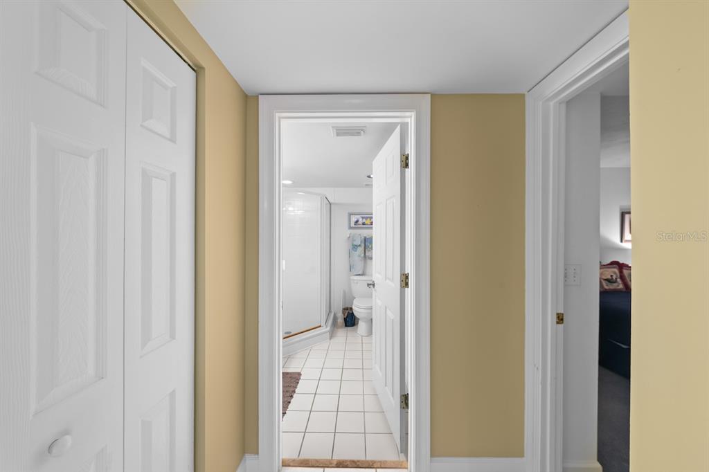 4575 South Atlantic Avenue, Unit 6209 Ponce Inlet, FL 32127 - Photo 40 of 53 a bathroom with a glass door shower