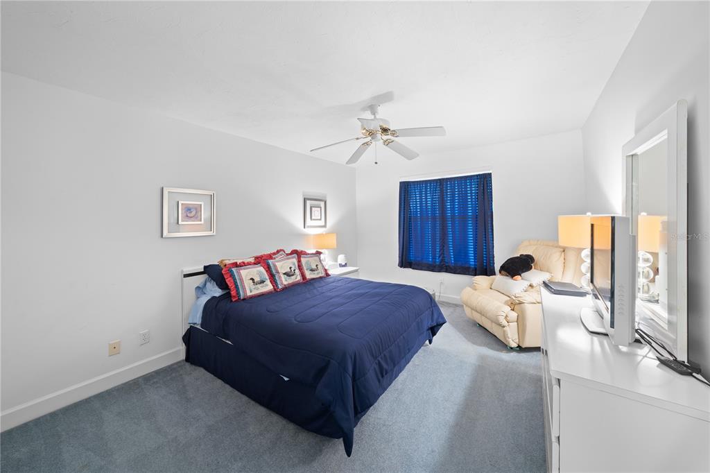 4575 South Atlantic Avenue, Unit 6209 Ponce Inlet, FL 32127 - Photo 42 of 53 a bedroom with a bed and window