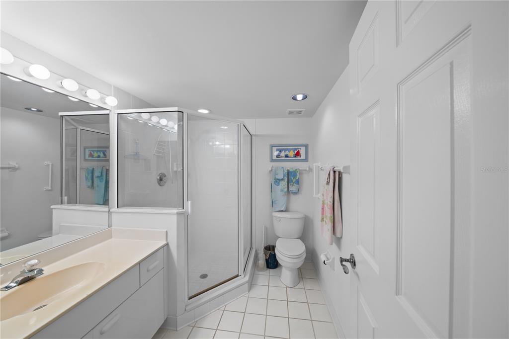 4575 South Atlantic Avenue, Unit 6209 Ponce Inlet, FL 32127 - Photo 42 of 53 a bathroom with a sink toilet and shower