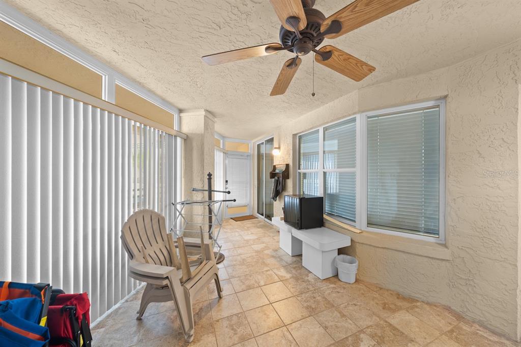 4575 South Atlantic Avenue, Unit 6209 Ponce Inlet, FL 32127 - Photo 46 of 53 a living room with furniture and a window