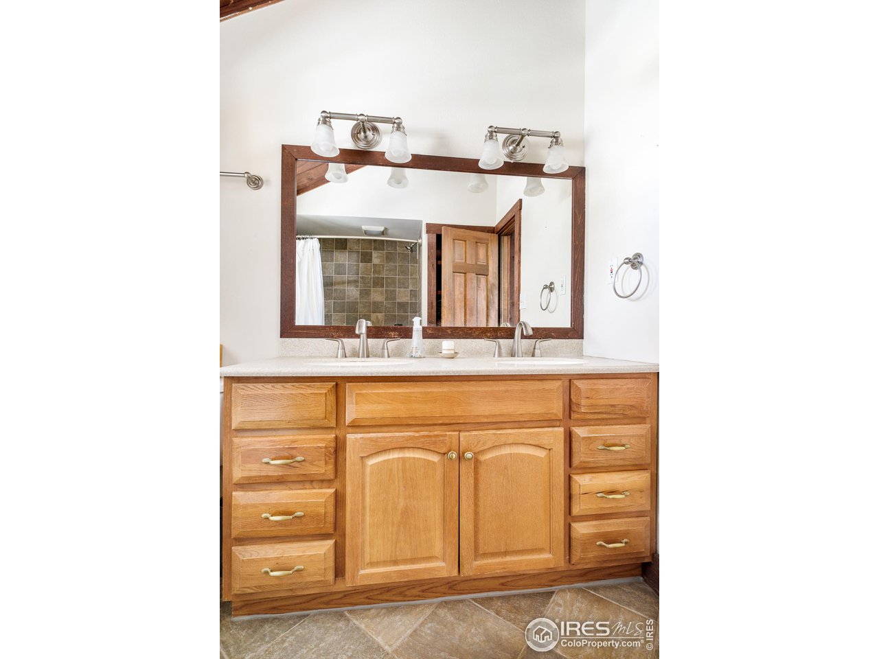 3714 Ridge Road Nederland, CO 80466 - Photo 17 of 38 a bathroom with a sink and a mirror