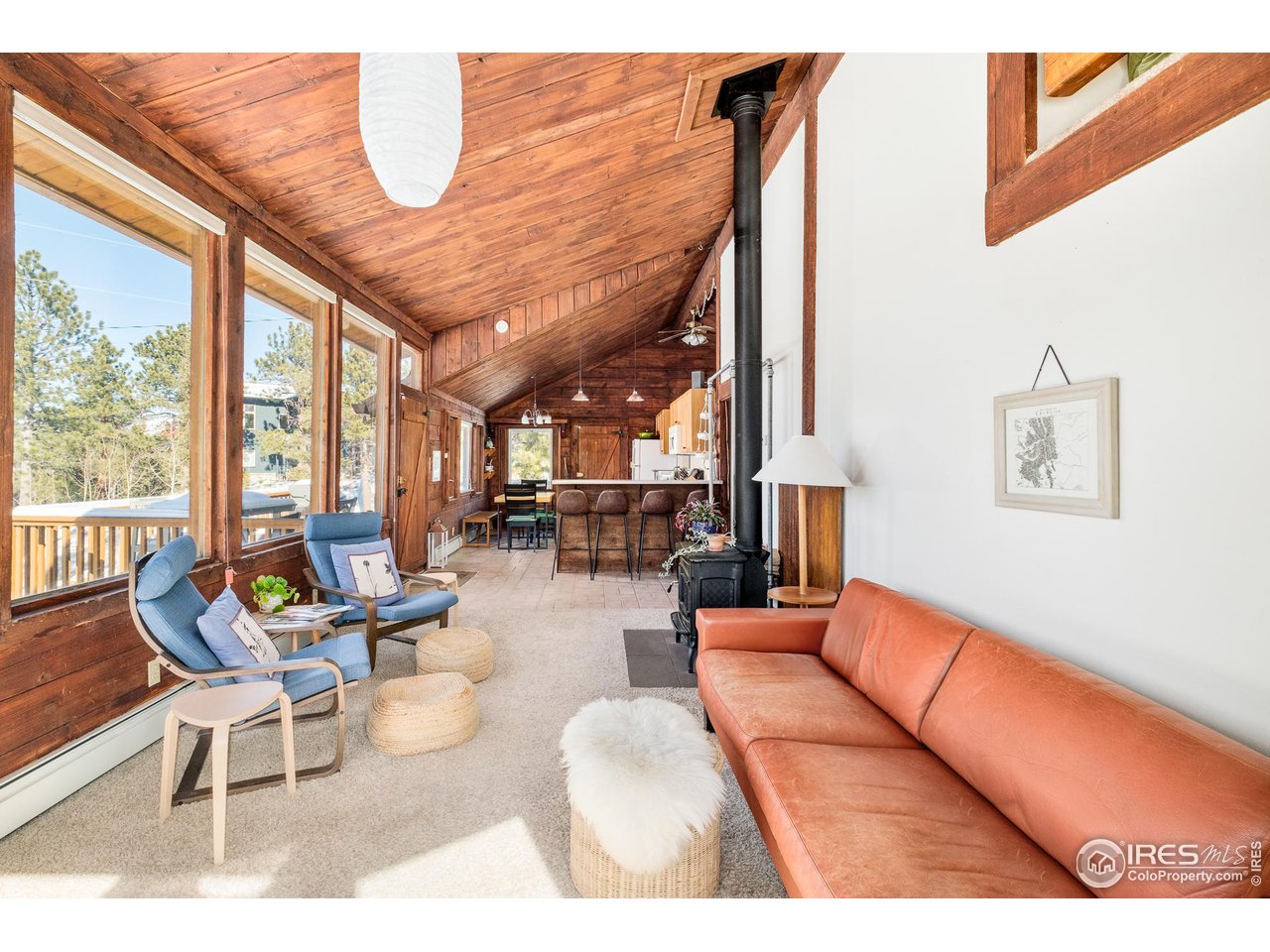 3714 Ridge Road Nederland, CO 80466 - Photo 10 of 38 a outdoor living space with furniture and a large window