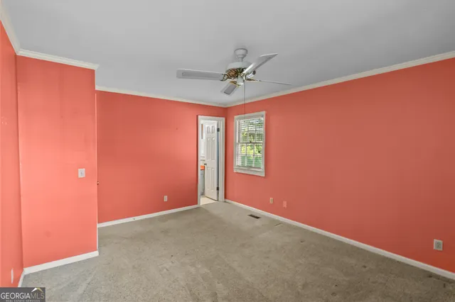 a bathroom with a sink a toilet and a shower curtain