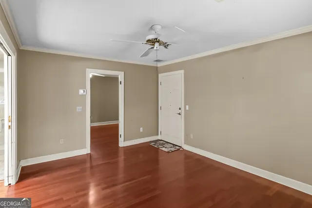 a spacious bathroom with a shower sink and mirror