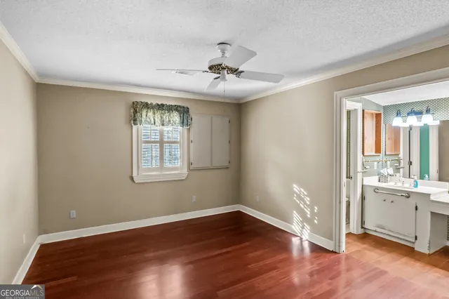 a bathroom with a sink vanity and a mirror