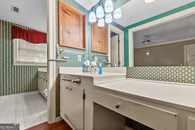 a living room with furniture and window