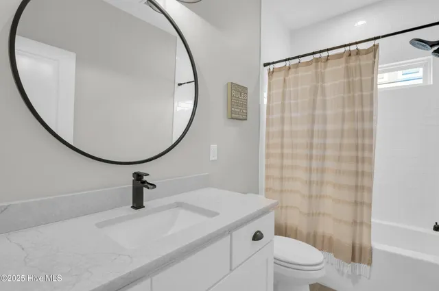 $750,000 | 331 Spicer Lake Drive, Holly Ridge, NC 28445