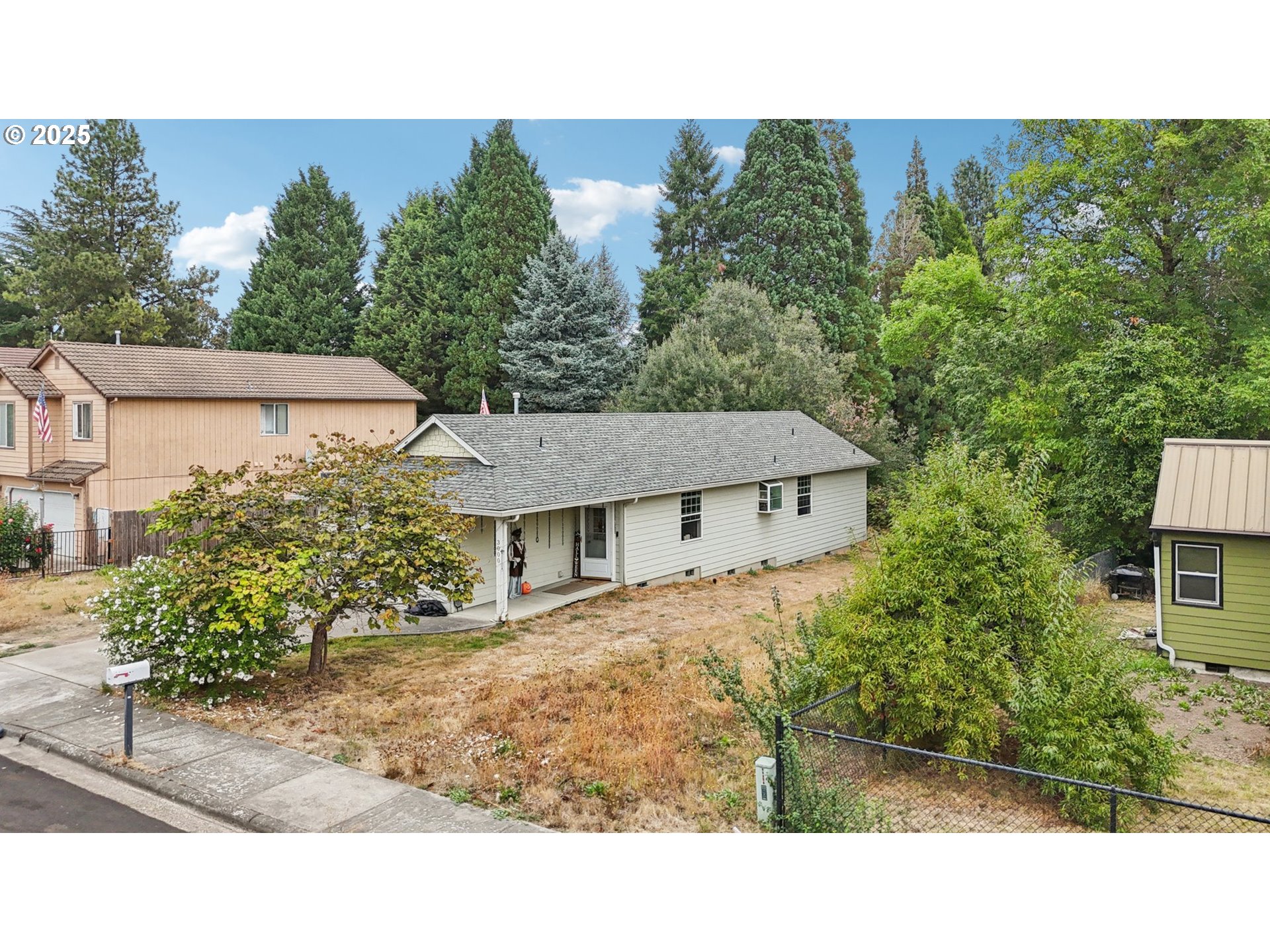 3014 Southwest 176th Avenue Beaverton, OR 97003 - Photo 7 of 16 a view of a house with a yard