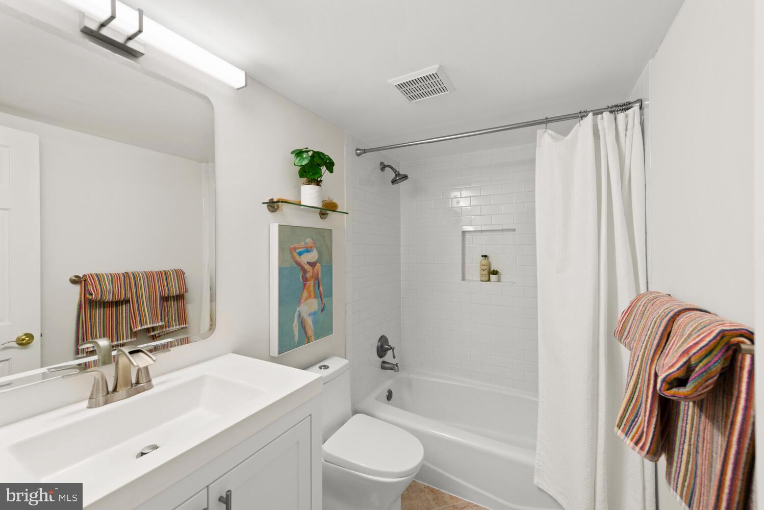 1745 Willard Street Northwest Washington, DC 20009 - Photo 47 of 86 Renovated hallway full bath with tub and niche