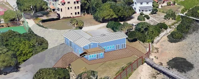 an outdoor sitting area with a tub