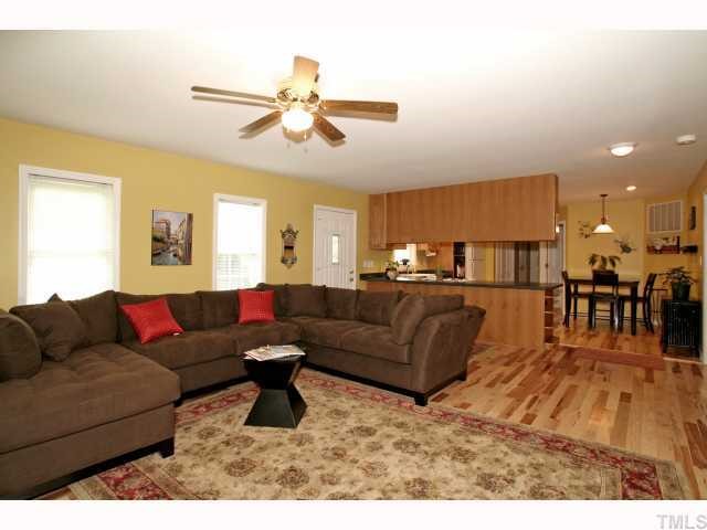 302 Graham Pond Road Angier, NC 27501 - Photo 3 of 12 a living room with furniture and kitchen view