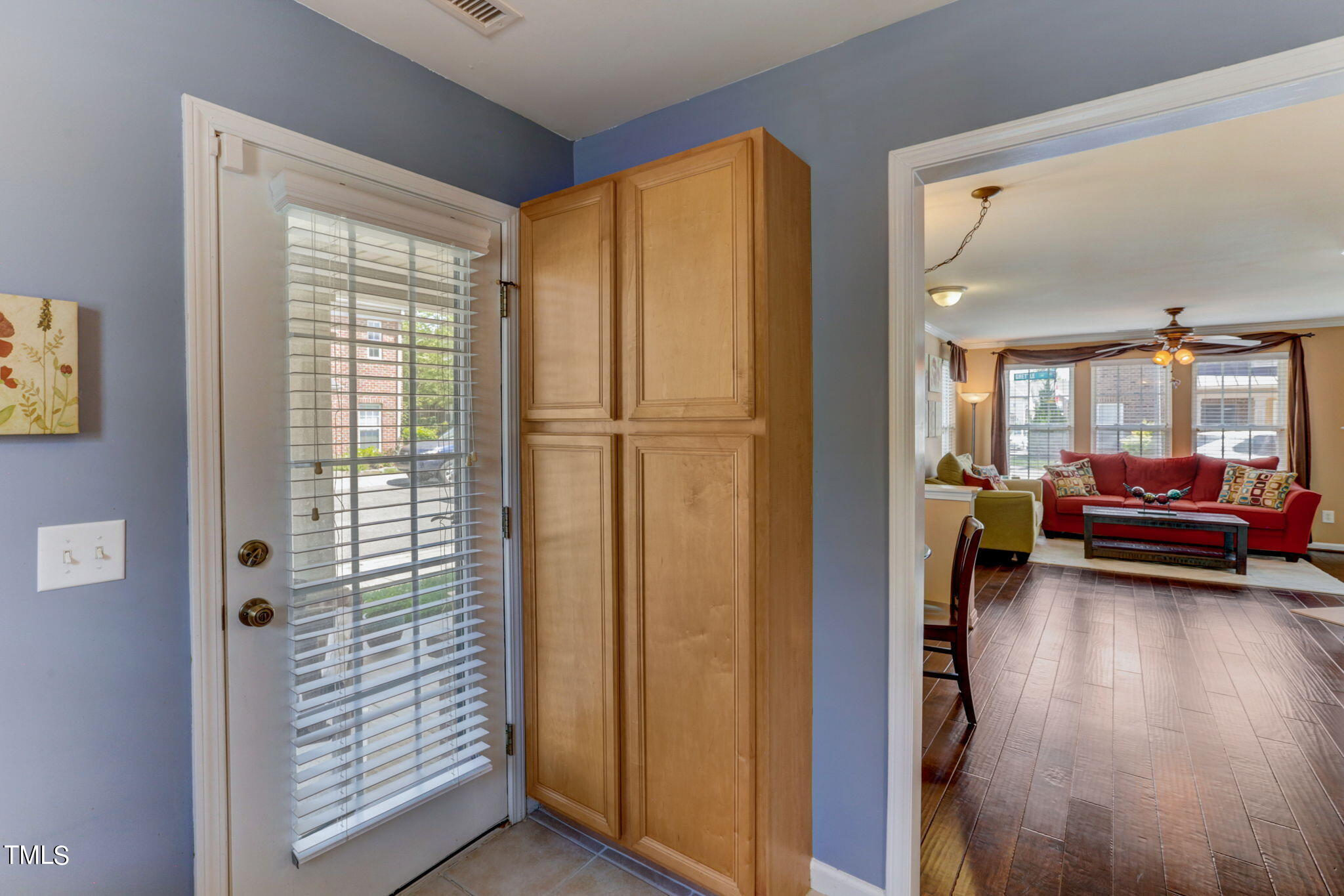9802 Grettle Court Raleigh, NC 27617 - Photo 12 of 22 a view of a living room and hardwood floor