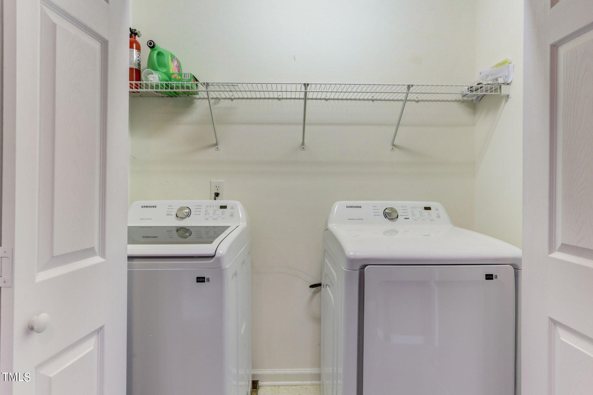 9802 Grettle Court Raleigh, NC 27617 - Photo 17 of 22 a utility room with dryer and washer