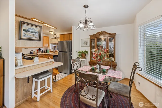 a view of a dining room with furniture window and outside view