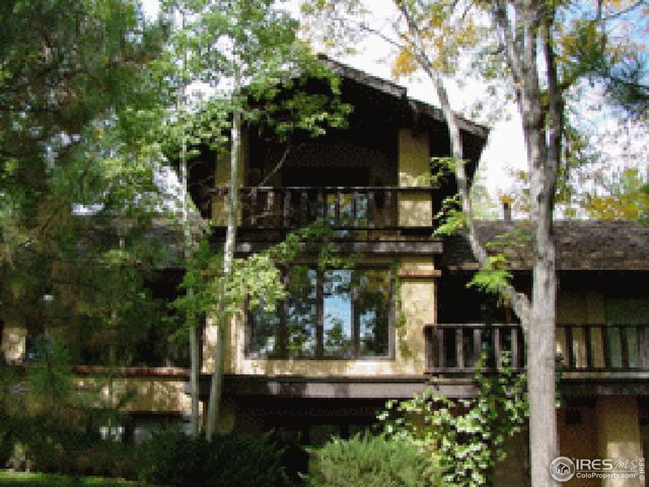 7130 Four Rivers Road Boulder, CO 80301 - Photo 5 of 10 a front view of a house with garden