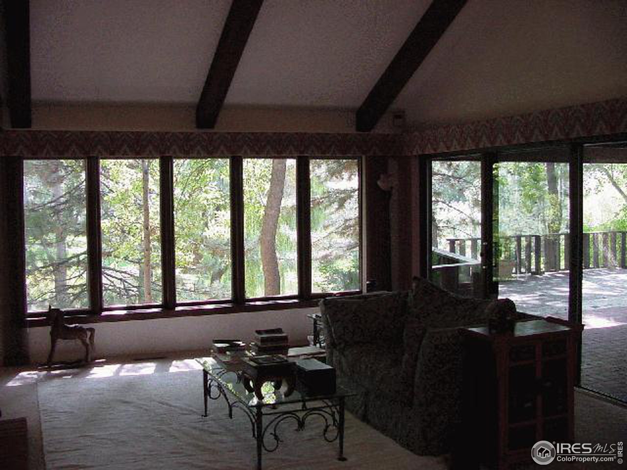 7130 Four Rivers Road Boulder, CO 80301 - Photo 6 of 10 a living room with furniture and a large window