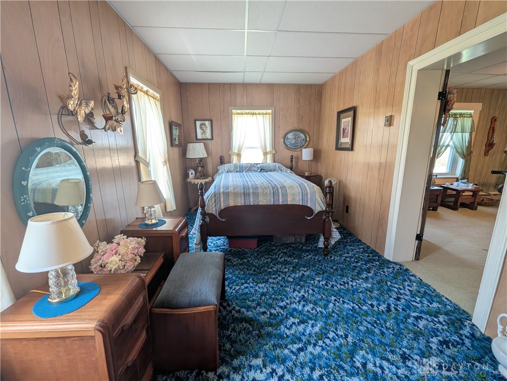 8713 Oakes Road Arcanum, OH 45304 - Photo 28 of 29 This cozy room offers a private retreat with classic paneling and inviting flooring.