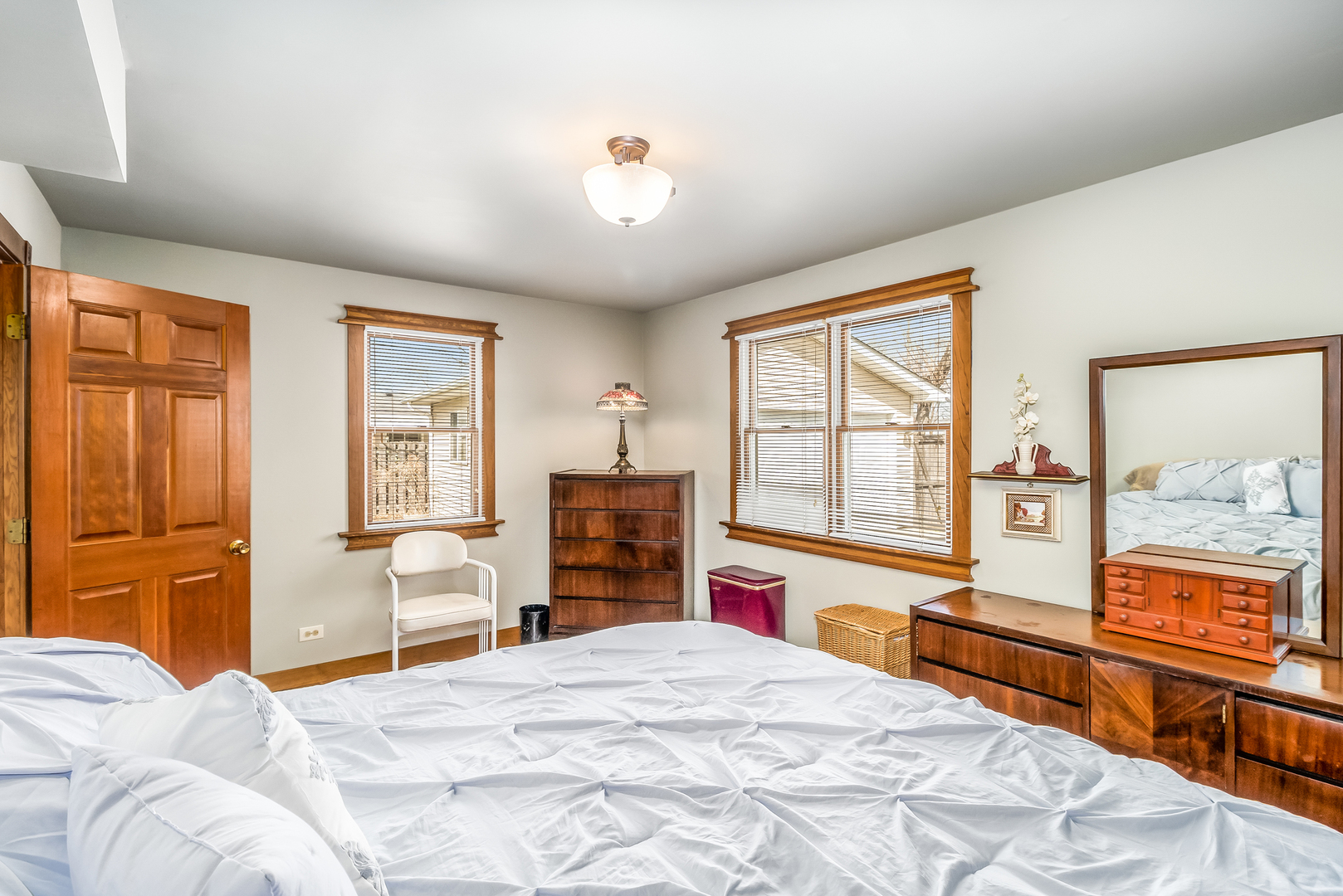518 Amherst Avenue Romeoville, IL 60446 - Photo 13 of 23 a bedroom with a bed and a large window with the outer view