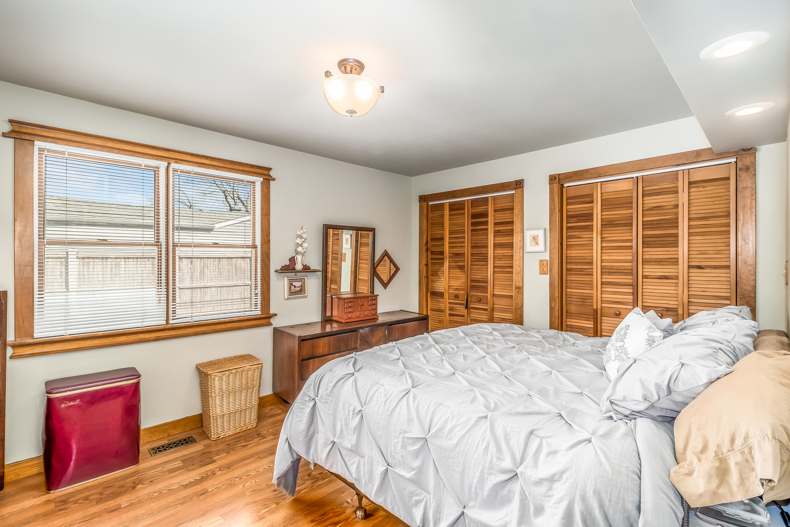 518 Amherst Avenue Romeoville, IL 60446 - Photo 15 of 23 a bedroom with a large bed and a large window with the outer view