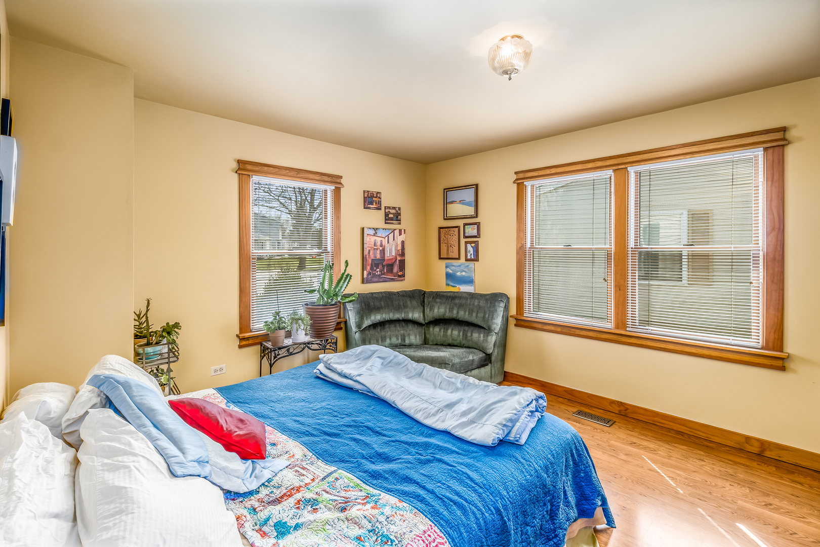 518 Amherst Avenue Romeoville, IL 60446 - Photo 19 of 23 a bedroom with a bed and wooden floor