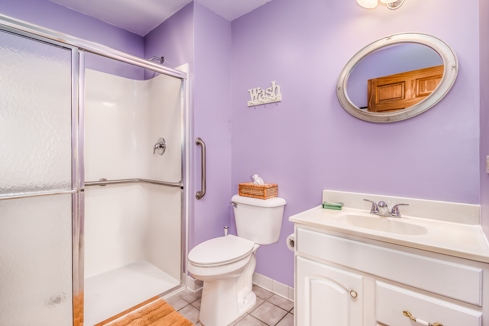 518 Amherst Avenue Romeoville, IL 60446 - Photo 21 of 23 a bathroom with a sink mirror vanity and toilet