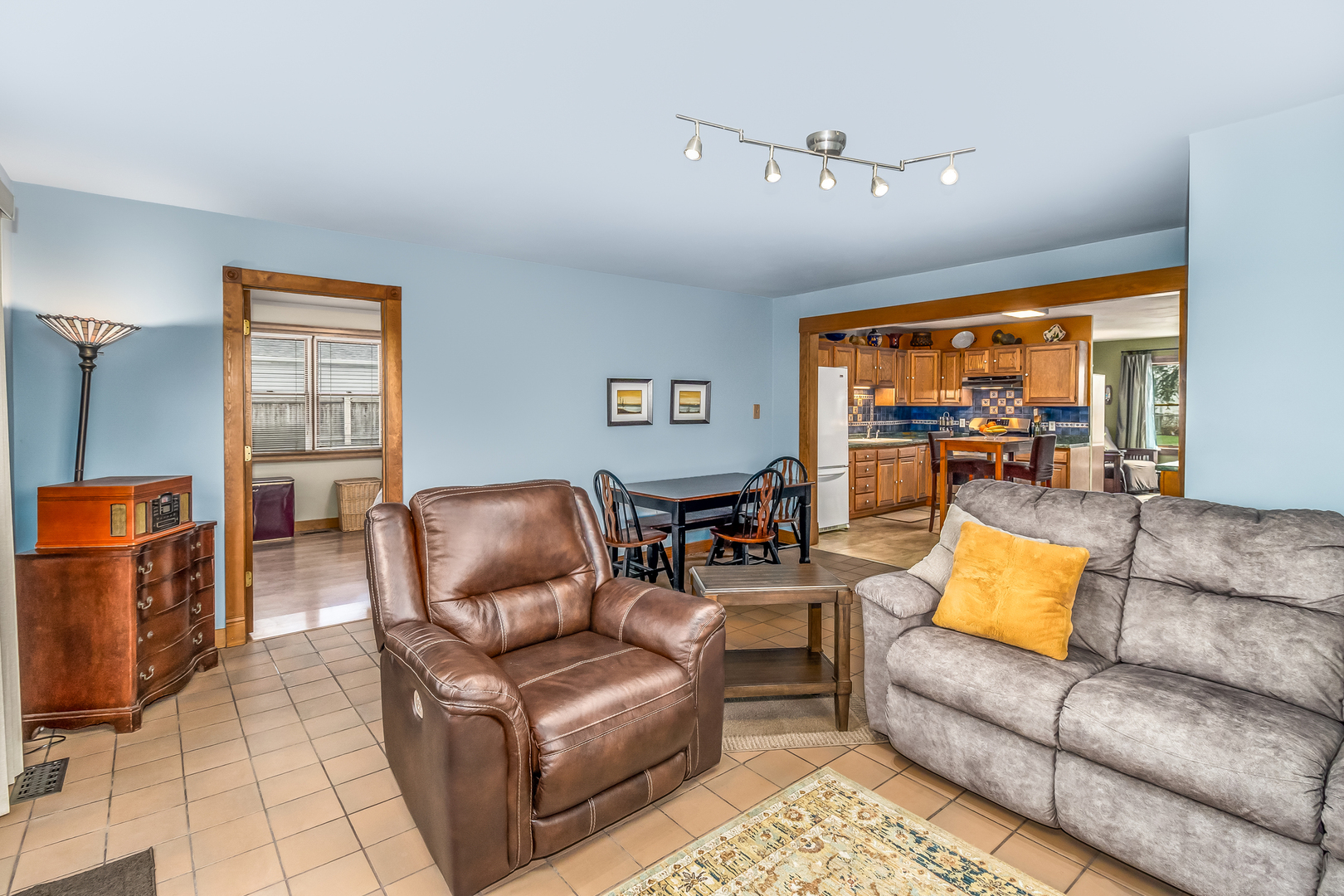 518 Amherst Avenue Romeoville, IL 60446 - Photo 7 of 23 a living room with furniture and a large window