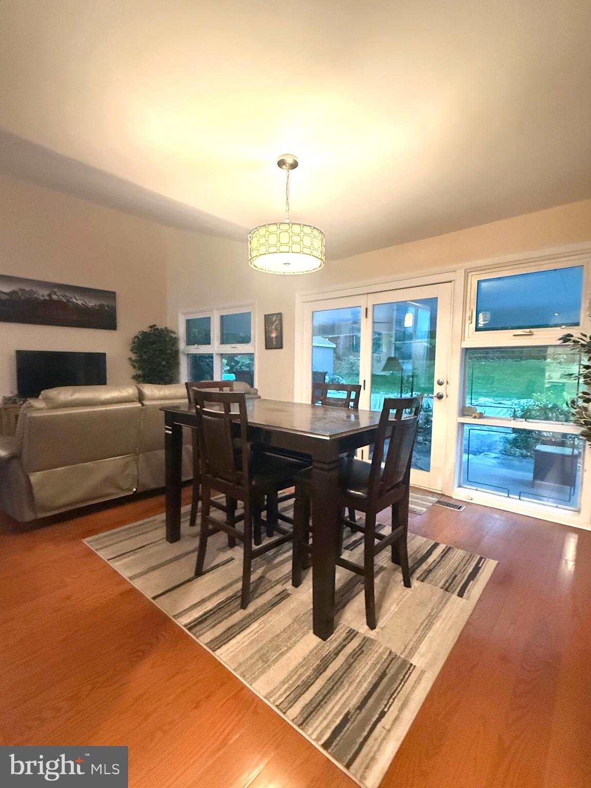 450 Foster Drive Springfield, PA 19064 - Photo 11 of 16 a view of a dining room with furniture window and wooden floor