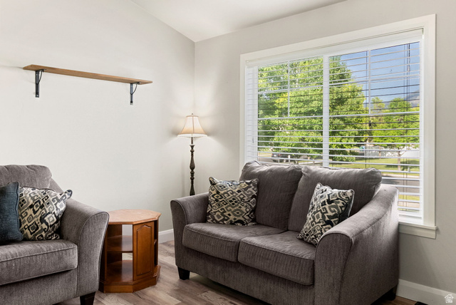 2485 South 1100th Street West Logan, UT 84321 - Photo 11 of 53 Bright living area featuring a large window with white blinds