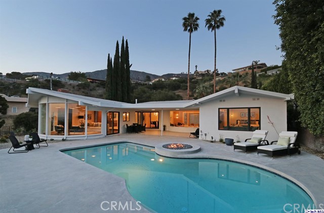 360 Kempton Road Glendale, CA 91202 - Photo 1 of 34 a swimming pool view with a outdoor seating space