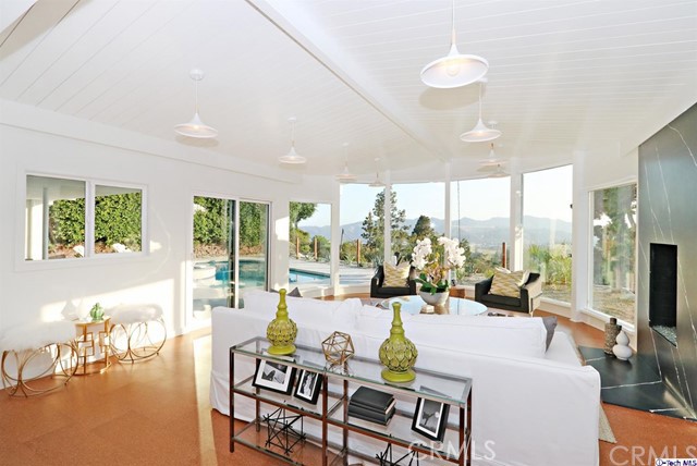 360 Kempton Road Glendale, CA 91202 - Photo 14 of 34 a living room with furniture and a large window