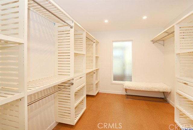 360 Kempton Road Glendale, CA 91202 - Photo 19 of 34 a view of walk in closet with empty racks
