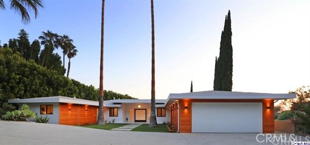 360 Kempton Road Glendale, CA 91202 - Photo 2 of 34 a front view of a house with a yard