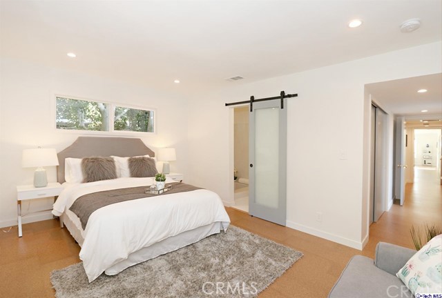 360 Kempton Road Glendale, CA 91202 - Photo 25 of 34 a bedroom with a bed and a rug