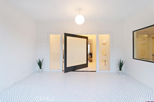 360 Kempton Road Glendale, CA 91202 - Photo 4 of 34 a view of a room with wooden floor and window