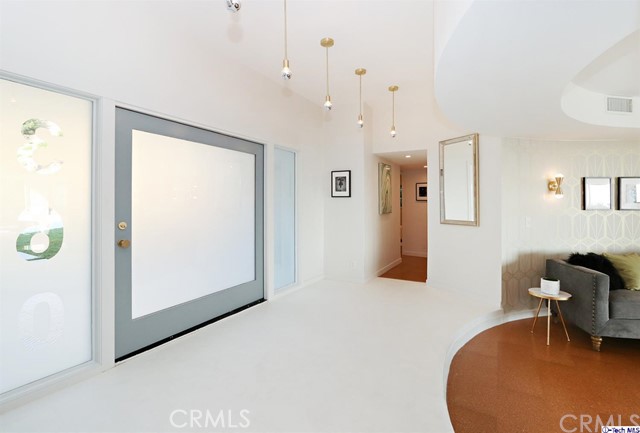 360 Kempton Road Glendale, CA 91202 - Photo 5 of 34 a room with furniture and a table