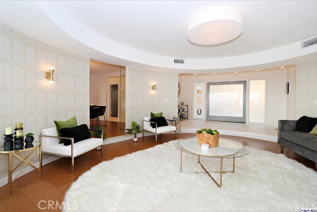 360 Kempton Road Glendale, CA 91202 - Photo 7 of 34 a living room with furniture and a wooden floor