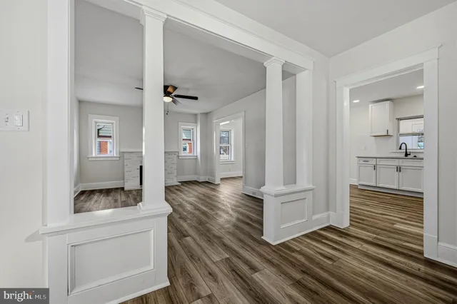 a view of a kitchen cabinets and wooden floor