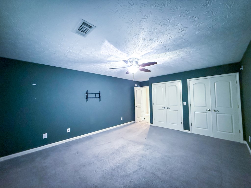 2525 Norris Road, Unit 36 Columbus, GA 31907 - Photo 19 of 28 a view of an empty room with a ceiling fan