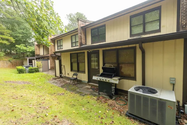 a house with trees in front of it