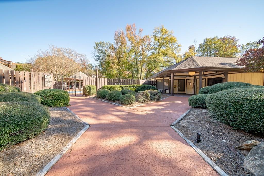 2525 Norris Road, Unit 36 Columbus, GA 31907 - Photo 22 of 28 a house with trees in front of it