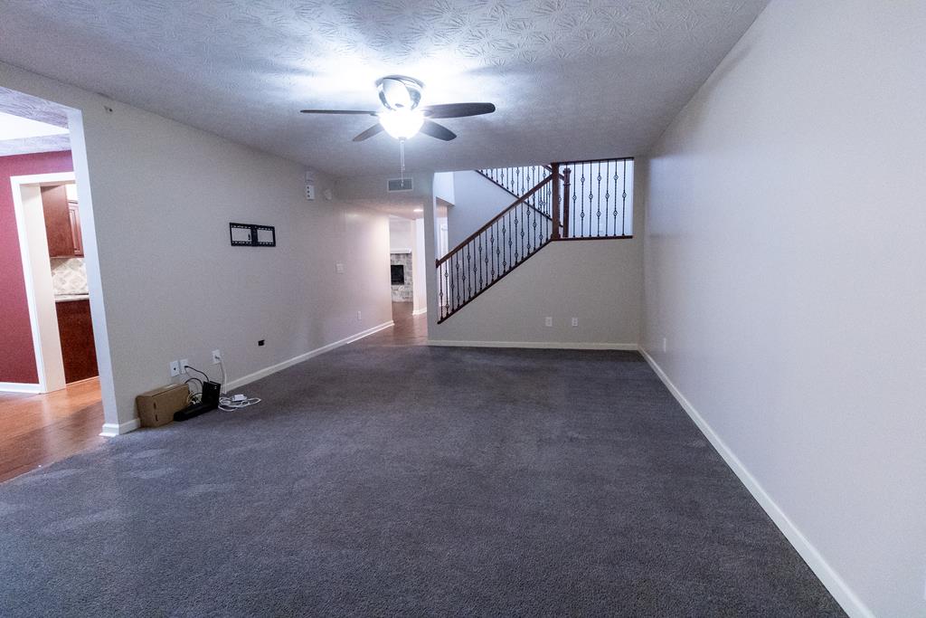 2525 Norris Road, Unit 36 Columbus, GA 31907 - Photo 9 of 28 a view of an empty room with stairs