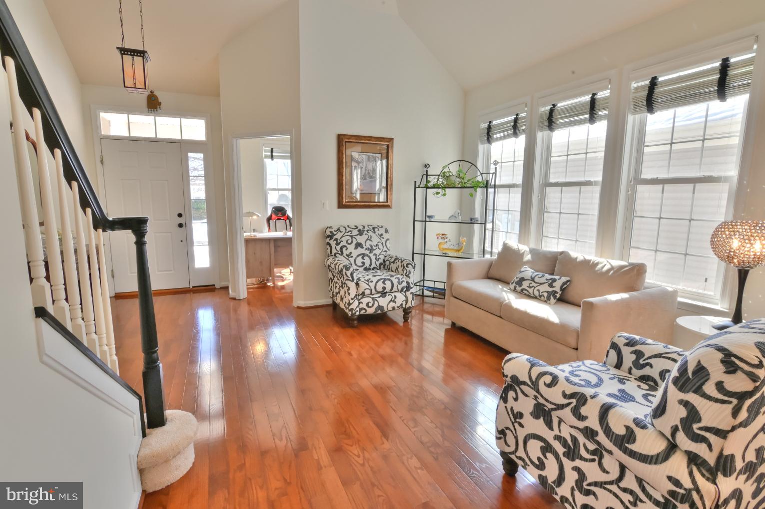 13170 Triple Crown Loop Gainesville, VA 20155 - Photo 10 of 71 a living room with furniture and wooden floor