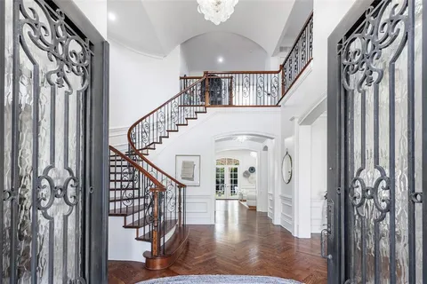 a view of entryway with wooden floor